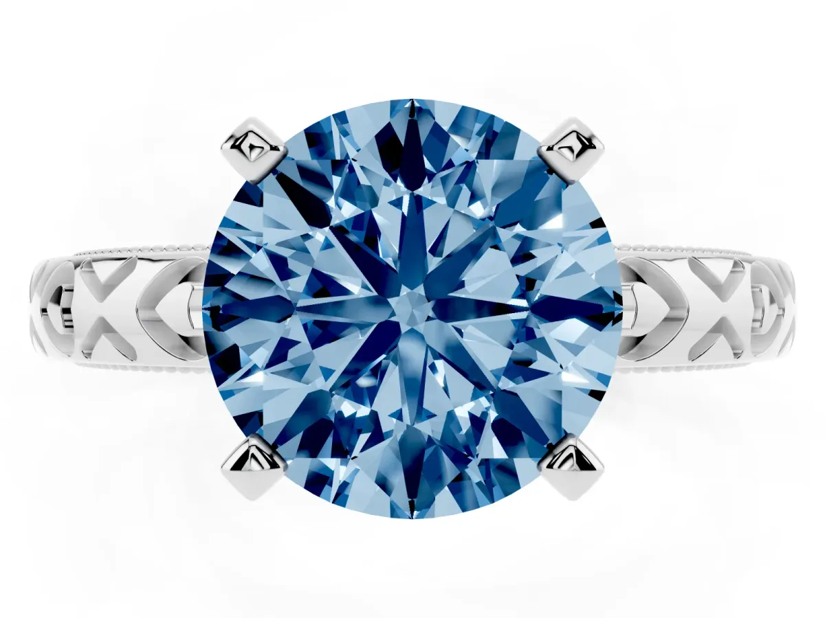 Fancy Blue Round Cut Solitaire Diamond Engagement Ring with XO Engraved Band and Four-Prong Setting Silver