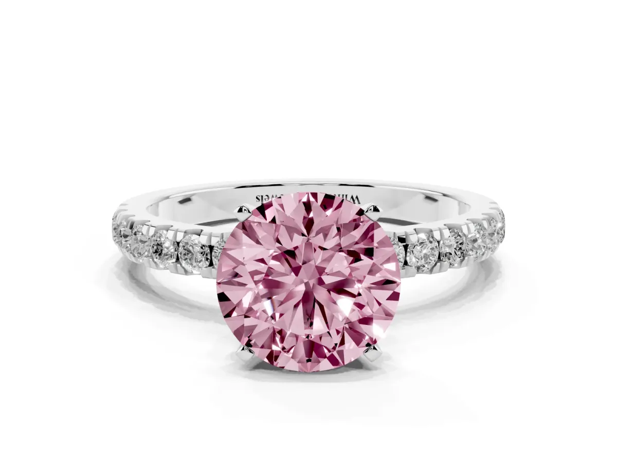 Fancy Pink Round Cut Diamond Solitaire Ring with Pavé Accents and Four-Prong Setting Platinum