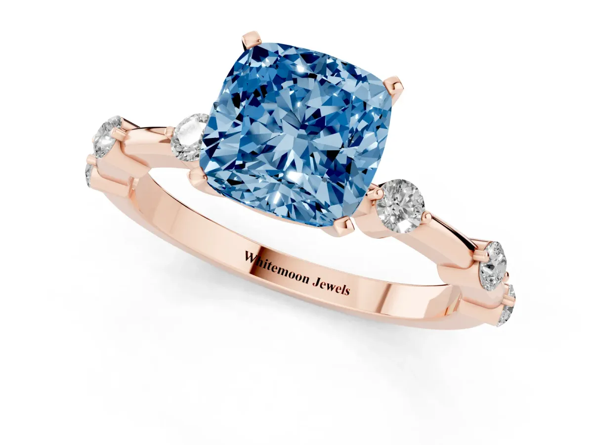 Fancy Blue Cushion Cut Solitaire Diamond Ring with Bezel Set Side Stones and Prong Setting Rose gold