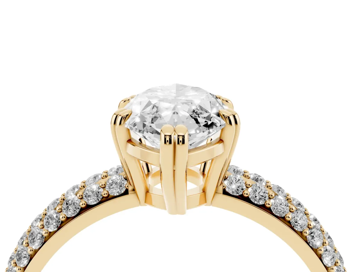 Marquise Cut Diamond Solitaire Ring with Multi-Row Round Pavé Band and Prong Setting Yellow gold