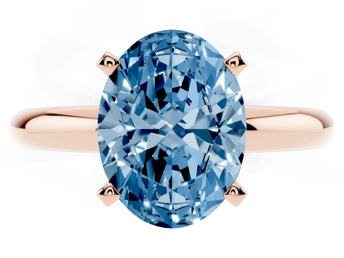 Fancy Blue Oval Cut Diamond Solitaire Engagement Ring with Round Band and Four-Prong Setting Rose gold