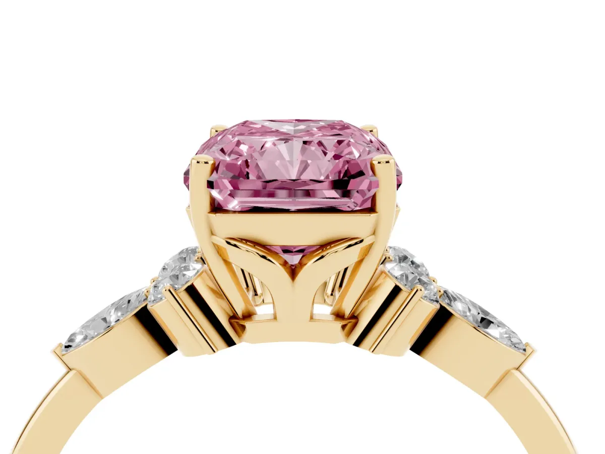 Fancy Pink Radiant Cut Brilliant Diamond Solitaire Ring with Pear Side Stones and Four-Prong Setting Yellow gold