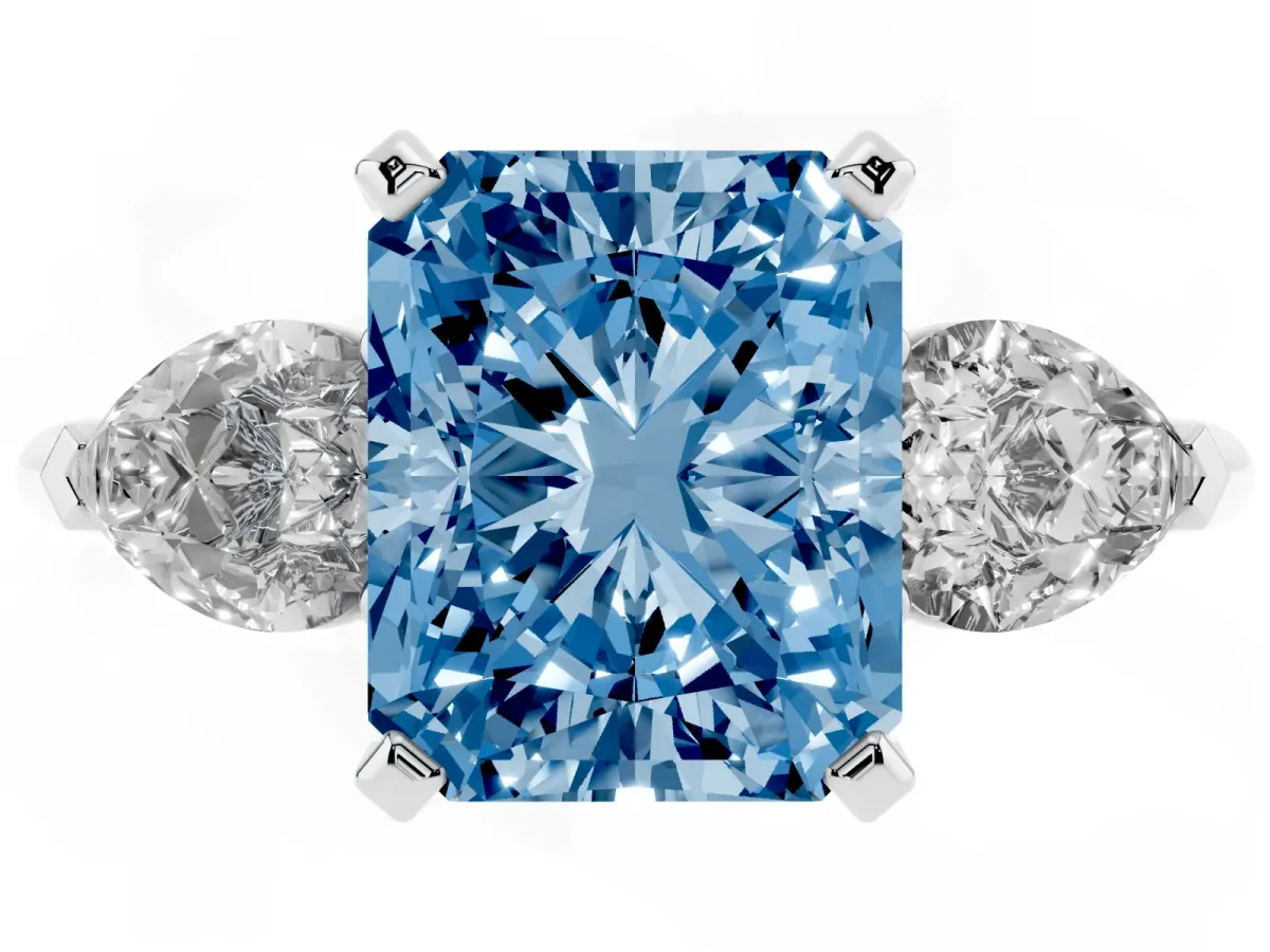 Fancy Blue Three-Stone Radiant Cut Diamond Ring with Pear Side Stones and Four-Prong Setting Platinum