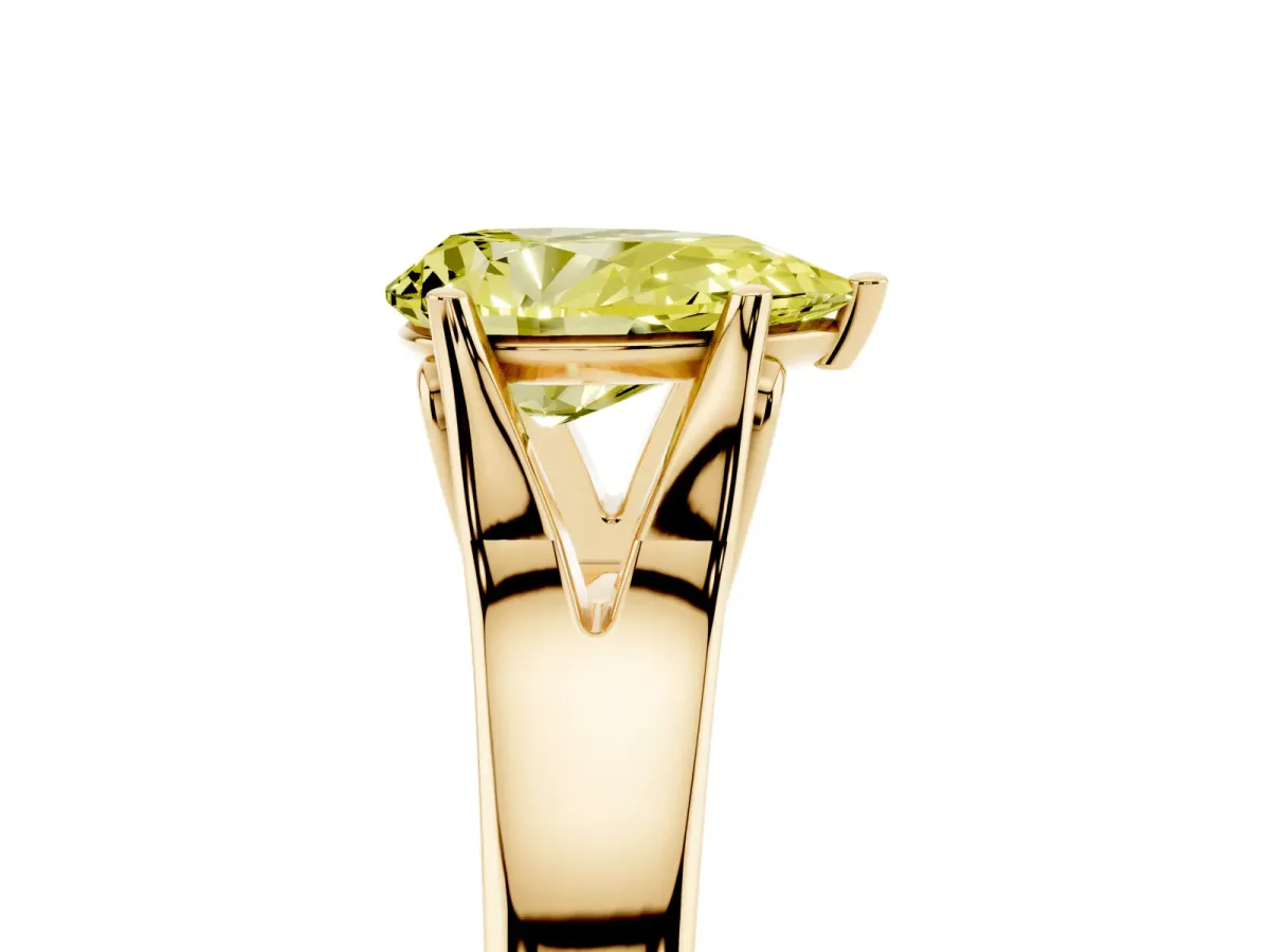 Fancy Yellow Pear Cut Solitaire Diamond Ring with Cathedral Band and Four-Prong Setting Yellow gold