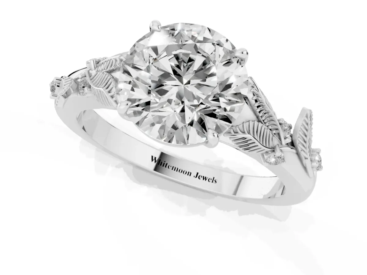 Round Cut Diamond Solitaire Ring with Leaf Motif Band and Four-Prong Setting Silver