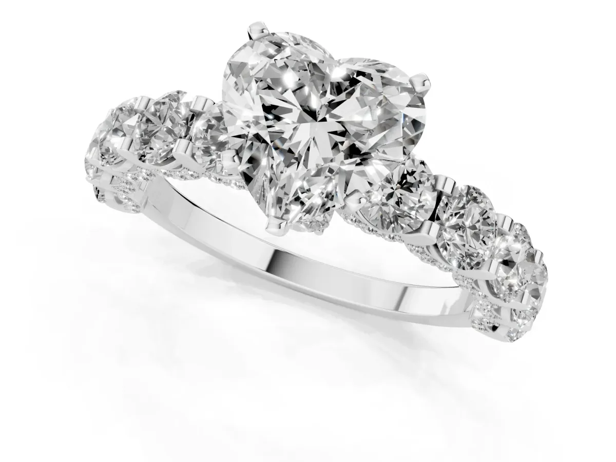 Heart Cut Diamond Side Stone Engagement Ring with Four-Prong Setting Silver