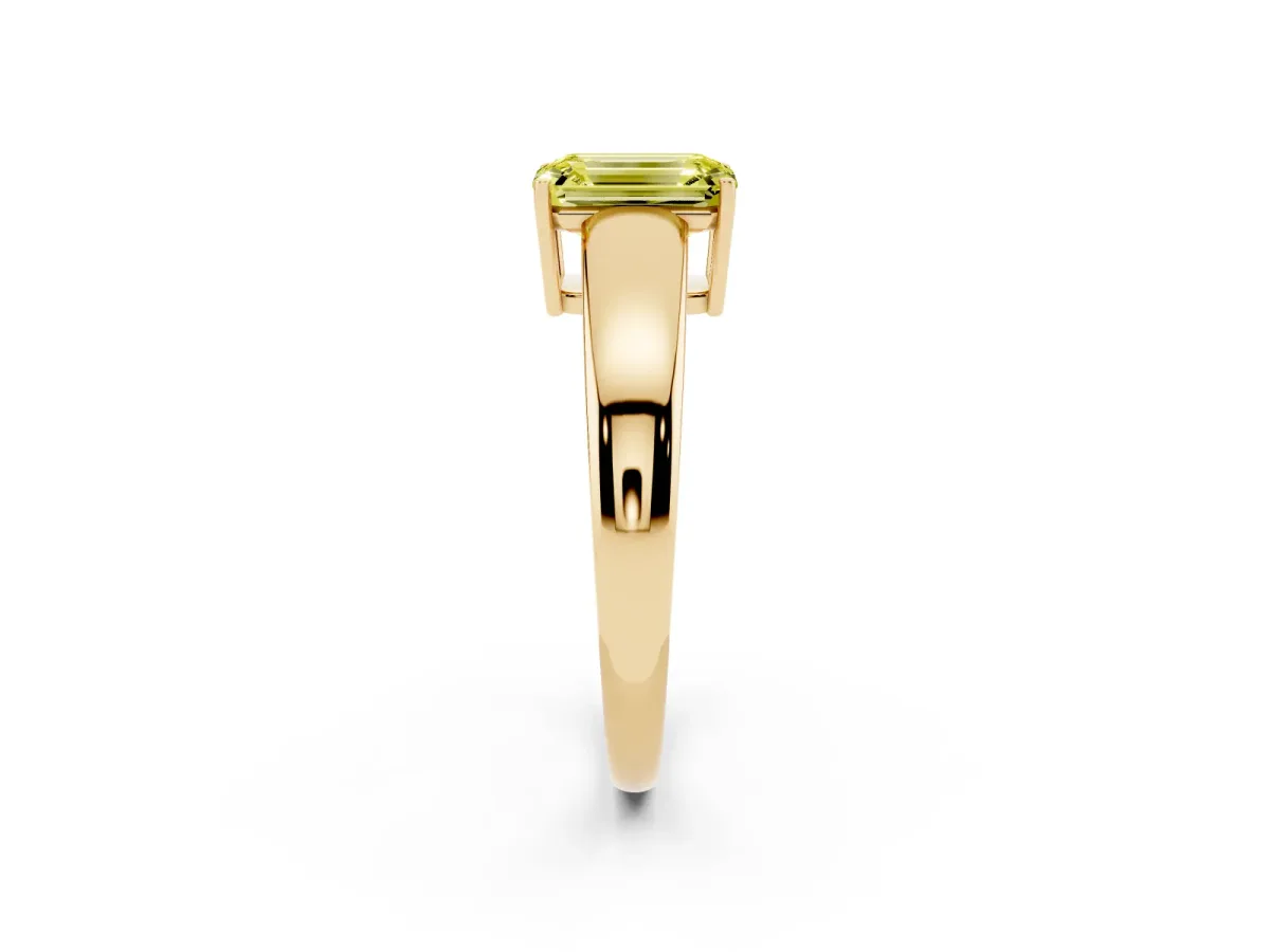 Fancy Yellow Emerald Cut Solitaire Diamond Ring with Tapered Band and Four-Prong Setting Yellow gold