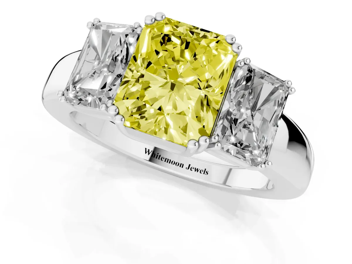 Fancy Yellow Three-Stone Radiant Cut Cut Diamond Ring with Channel Set Band and Four-Prong Setting Platinum