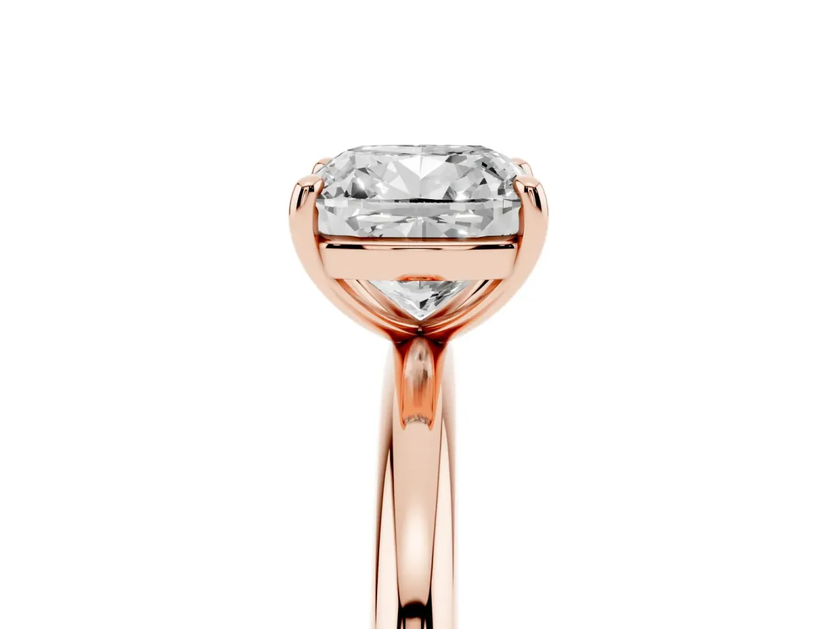 Cushion Cut Solitaire Diamond Ring with Four-Prong Setting on a Plain Band Rose gold