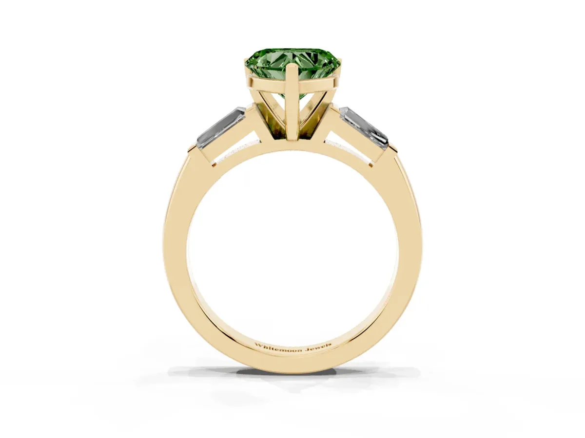 Fancy Green Heart Cut Solitaire with Tapered Baguette Side Stones on a Classic Band with Four-Prong Setting Yellow gold