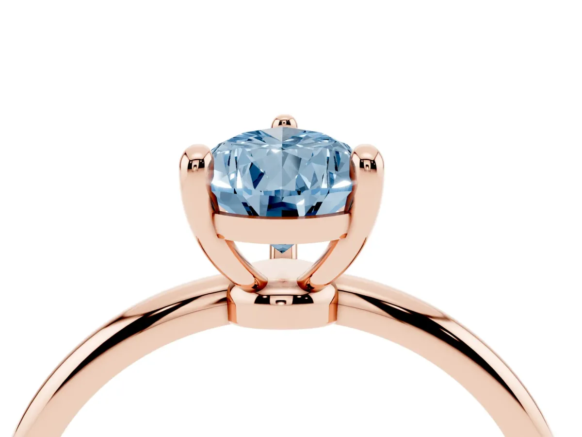Fancy Blue Pear Cut Solitaire Diamond Ring with 4-Prong Setting on a Classic Band Rose gold