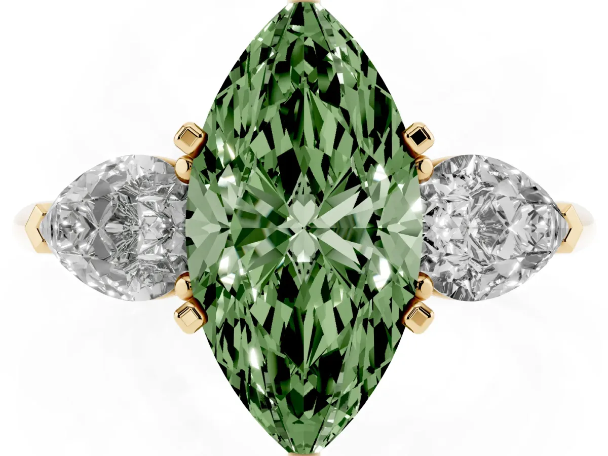 Fancy Green Three-Stone Marquise Cut Diamond Ring with Pear Side Stones and Four-Prong Setting Yellow gold