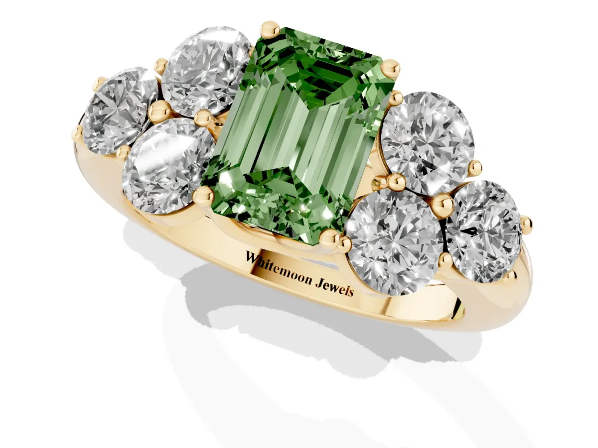 Fancy Green Emerald Cut Cut Diamond Cluster Ring with Round Accent Stones and Prong Setting on a Classic Band Yellow gold