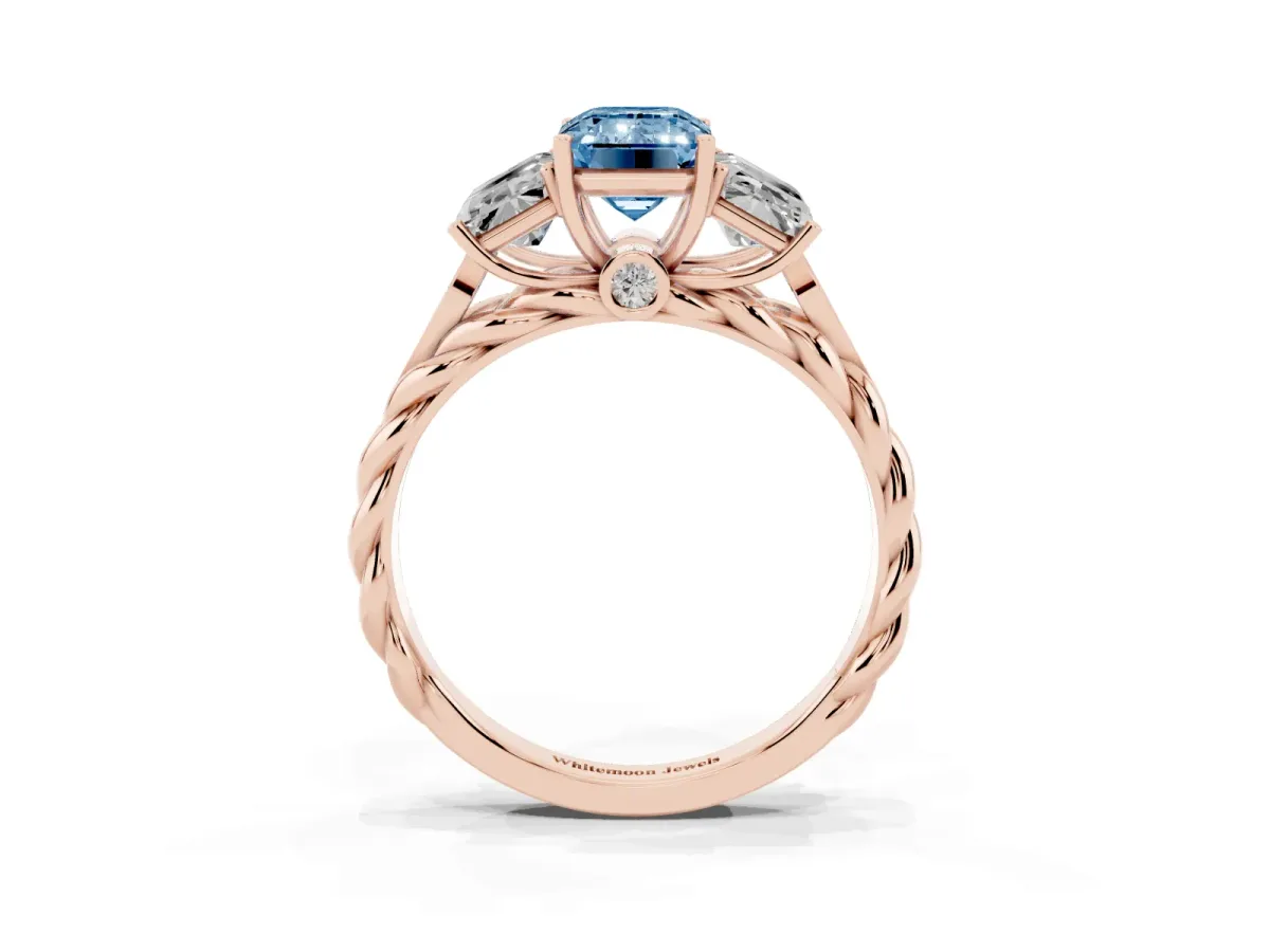 Fancy Blue Three-Stone Emerald Cut Diamond Braided Band Ring with Four-Prong Setting Rose gold