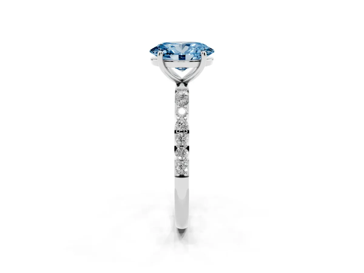 Fancy Blue Oval Cut Diamond Solitaire Ring with Round Pavé Shoulders and Prong Setting Silver