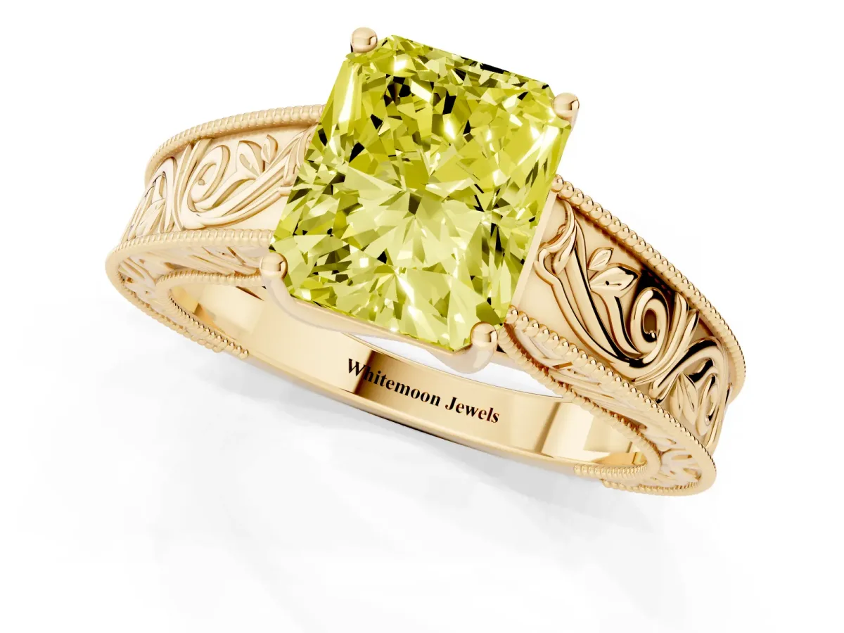 Fancy Yellow Radiant Cut Diamond Solitaire Ring with Engraved Band and Four-Prong Setting Yellow gold