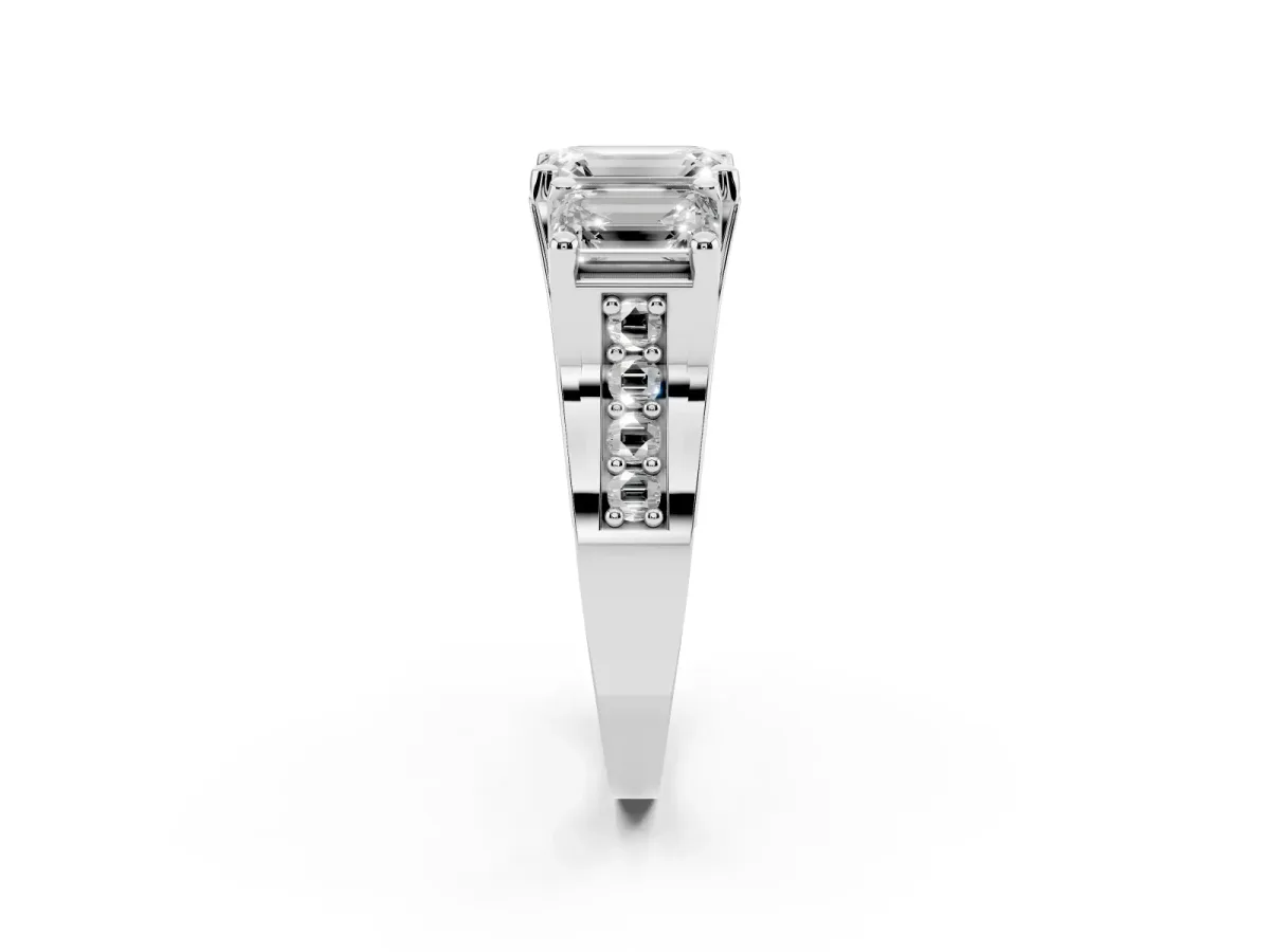 Emerald Cut Diamond Three-Stone Ring with Channel Set Band and Four-Prong Setting Silver