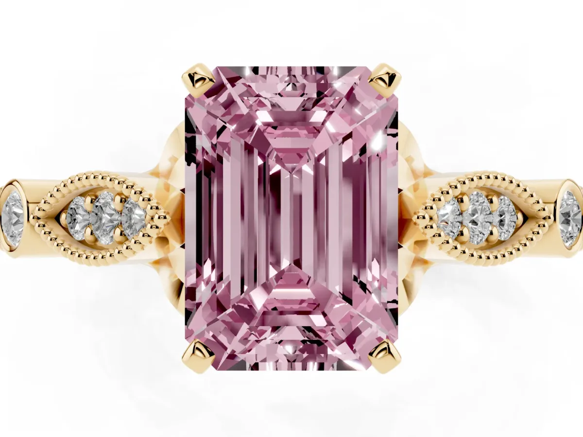 Fancy Pink Emerald Cut Cut Diamond with Milgrain Marquise and Bezel Accents on a Solitaire Band with Prong Setting Yellow gold