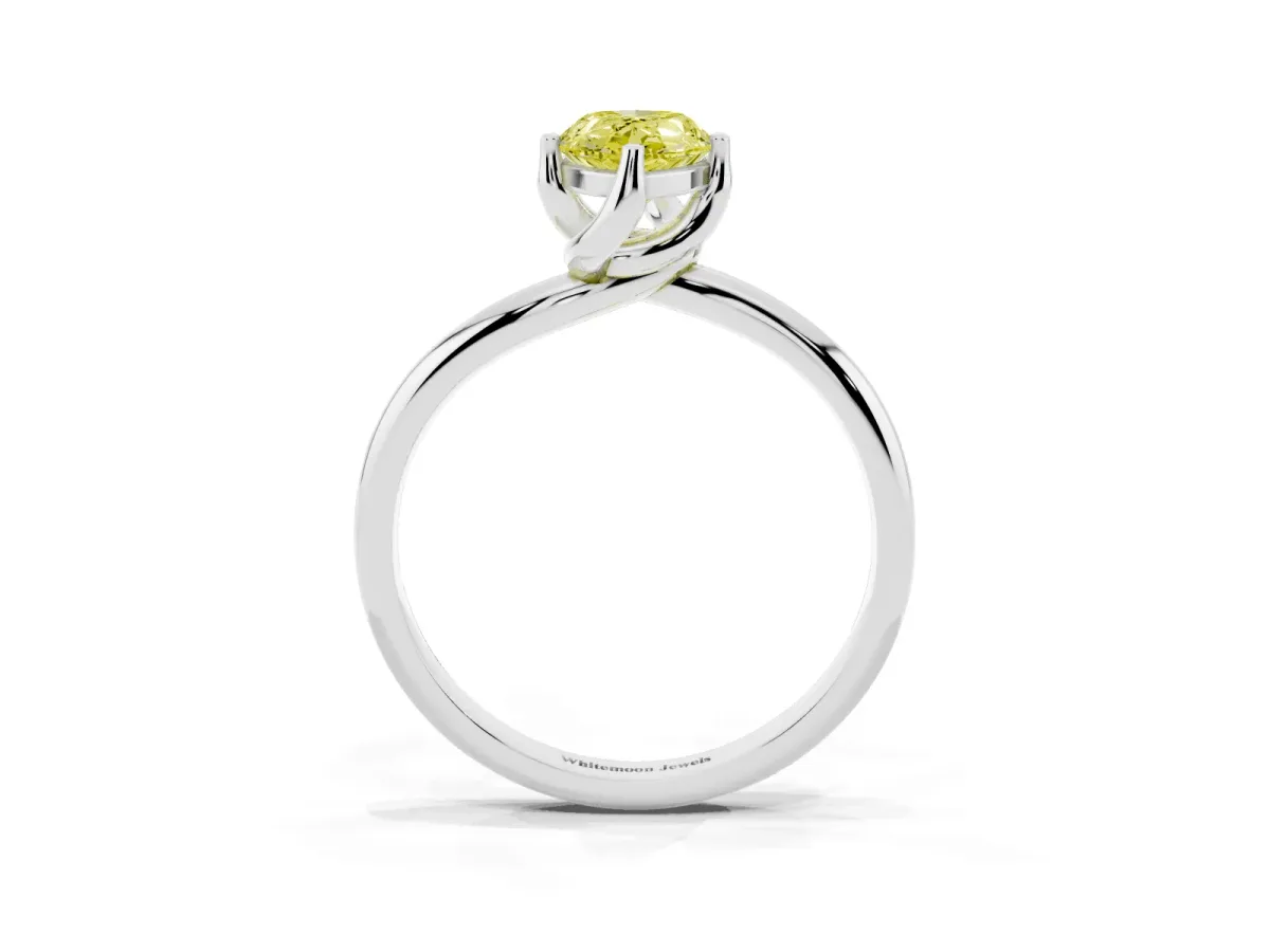 Fancy Yellow Pear Cut Diamond Solitaire Engagement Ring with Four-Prong Setting and Classic Band Silver