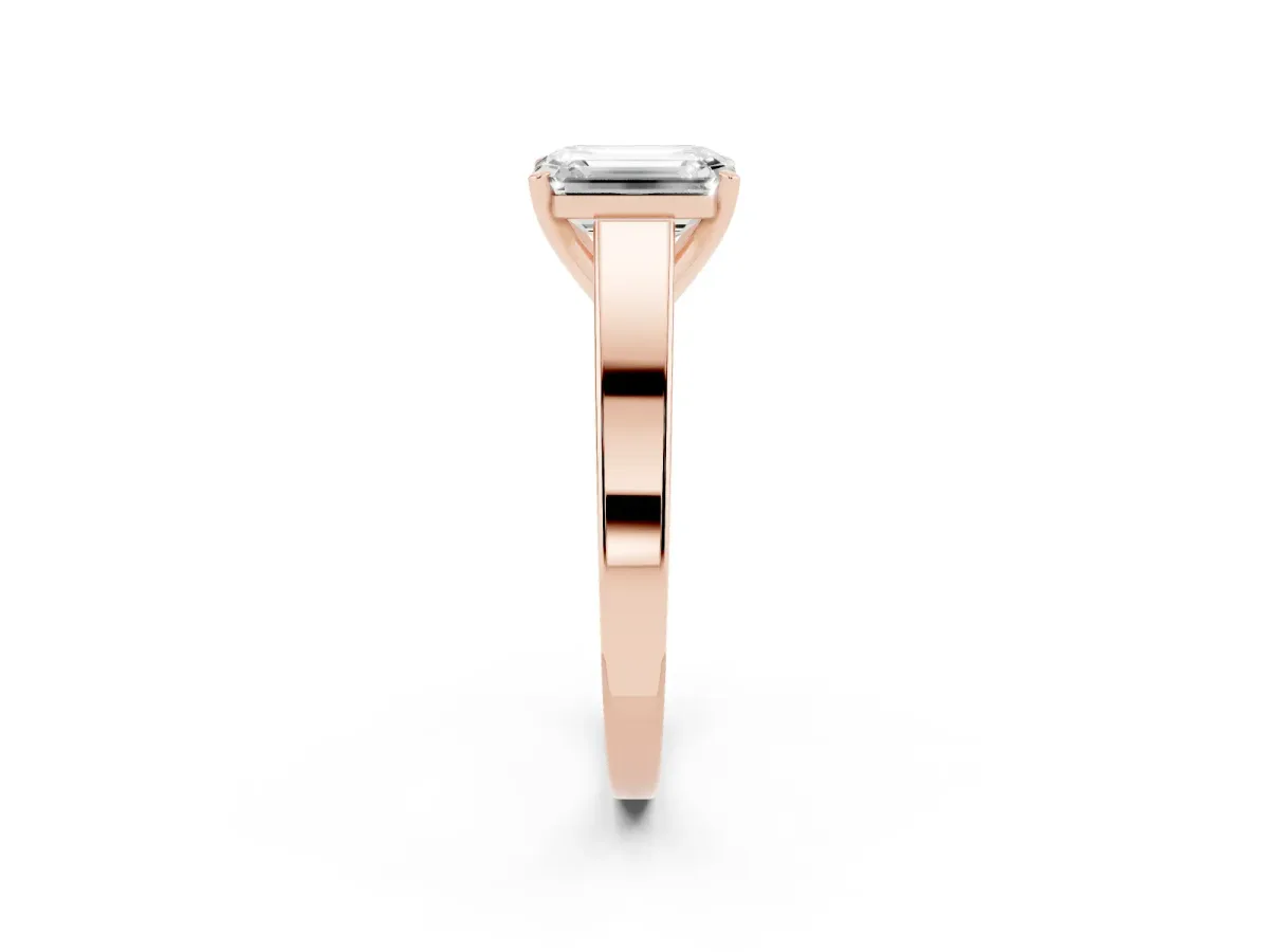 Emerald Cut Solitaire Engagement Ring with Four-Prong Setting and Tapered Band Rose gold