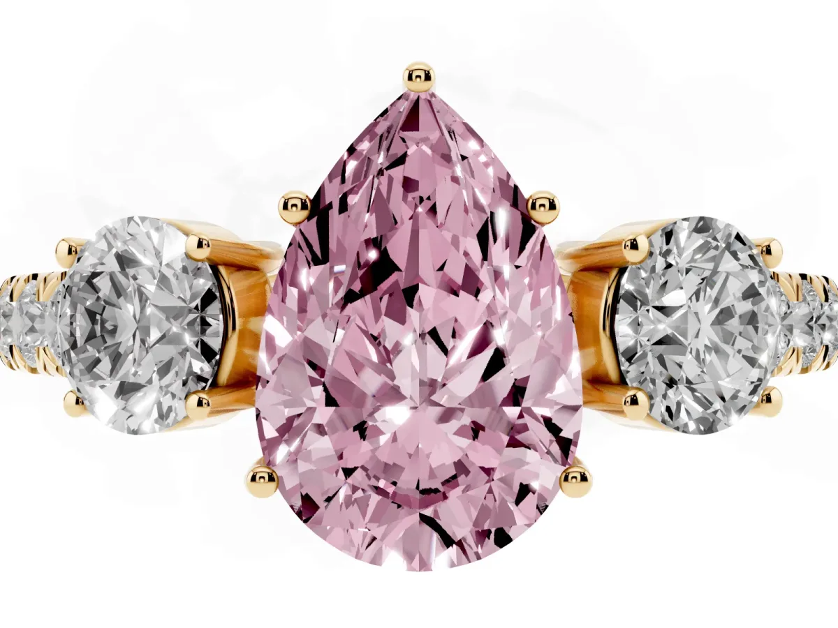 Fancy Pink Pear Cut Cut Diamond Three-Stone Ring with Round Side Stones and Pavé Band Yellow gold