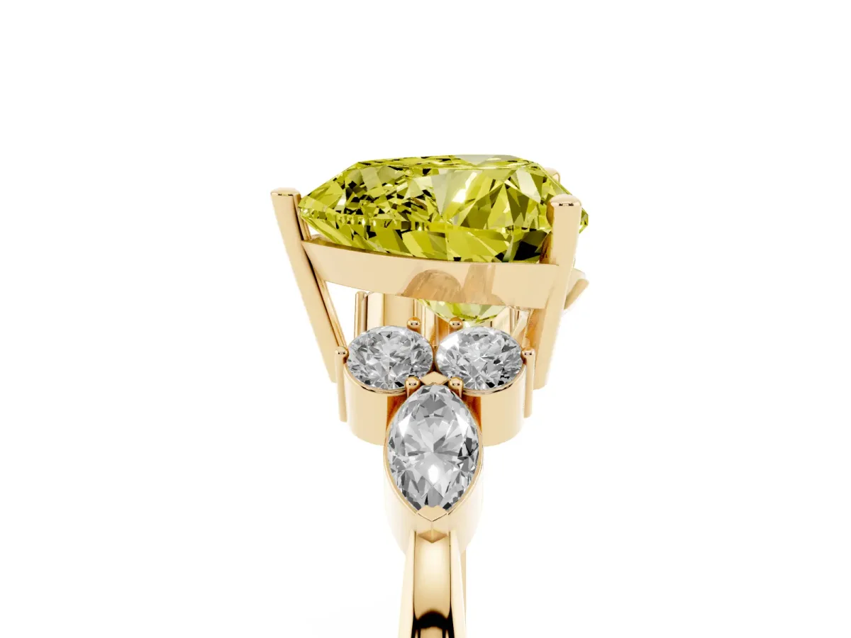 Fancy Yellow Heart Cut Brilliant Diamond Solitaire Ring with Pear Side Stones and Four-Prong Setting Yellow gold