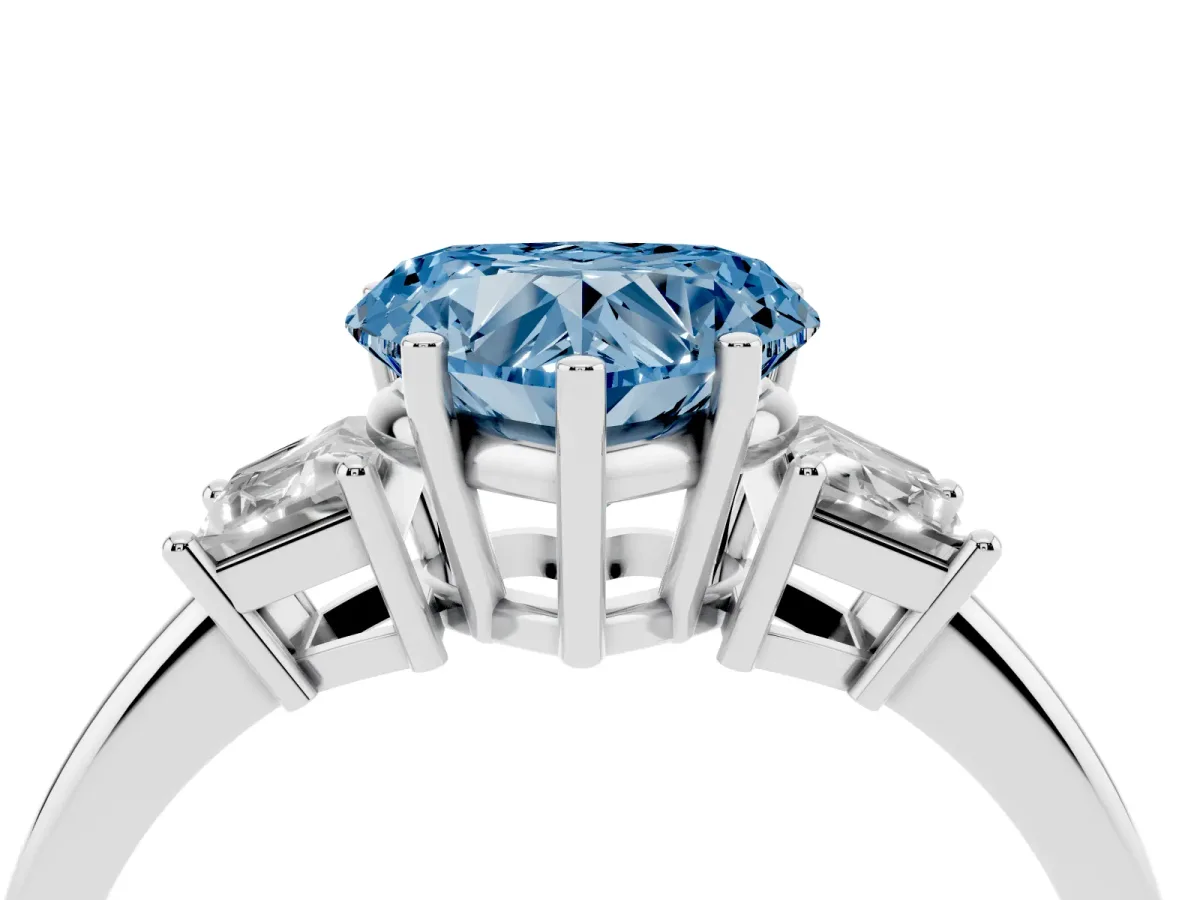 Fancy Blue Heart Cut Diamond Three-Stone Ring with Trapezoid Side Stones and Prong Setting Silver