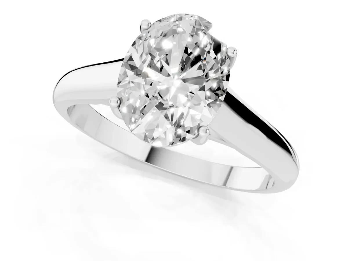 Oval Cut Solitaire Engagement Ring with Tapered Band and Four-Prong Setting Platinum