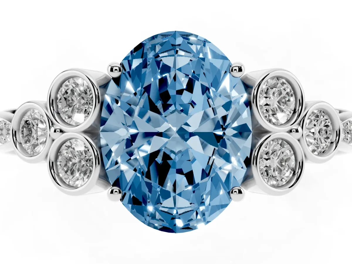 Fancy Blue Oval Cut Cut Diamond Engagement Ring with Bezel Set Round Side Stones and Prong Setting Silver