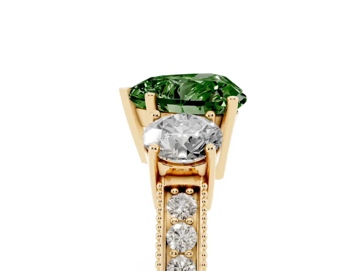 Fancy Green Heart Cut Three-Stone Diamond Ring with Pavé Band and Four-Prong Setting Yellow gold
