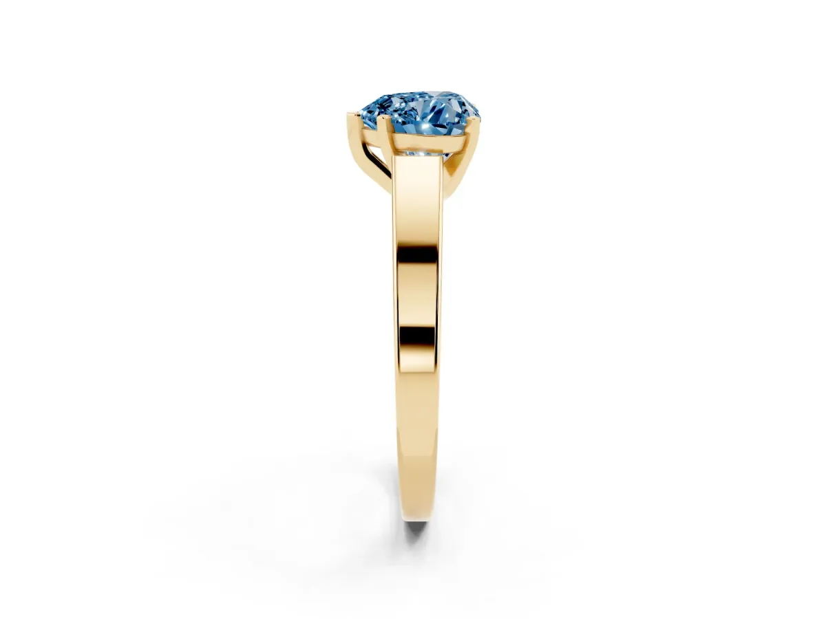 Fancy Blue Heart Cut Solitaire Engagement Ring with Four-Prong Setting and Tapered Band Yellow gold