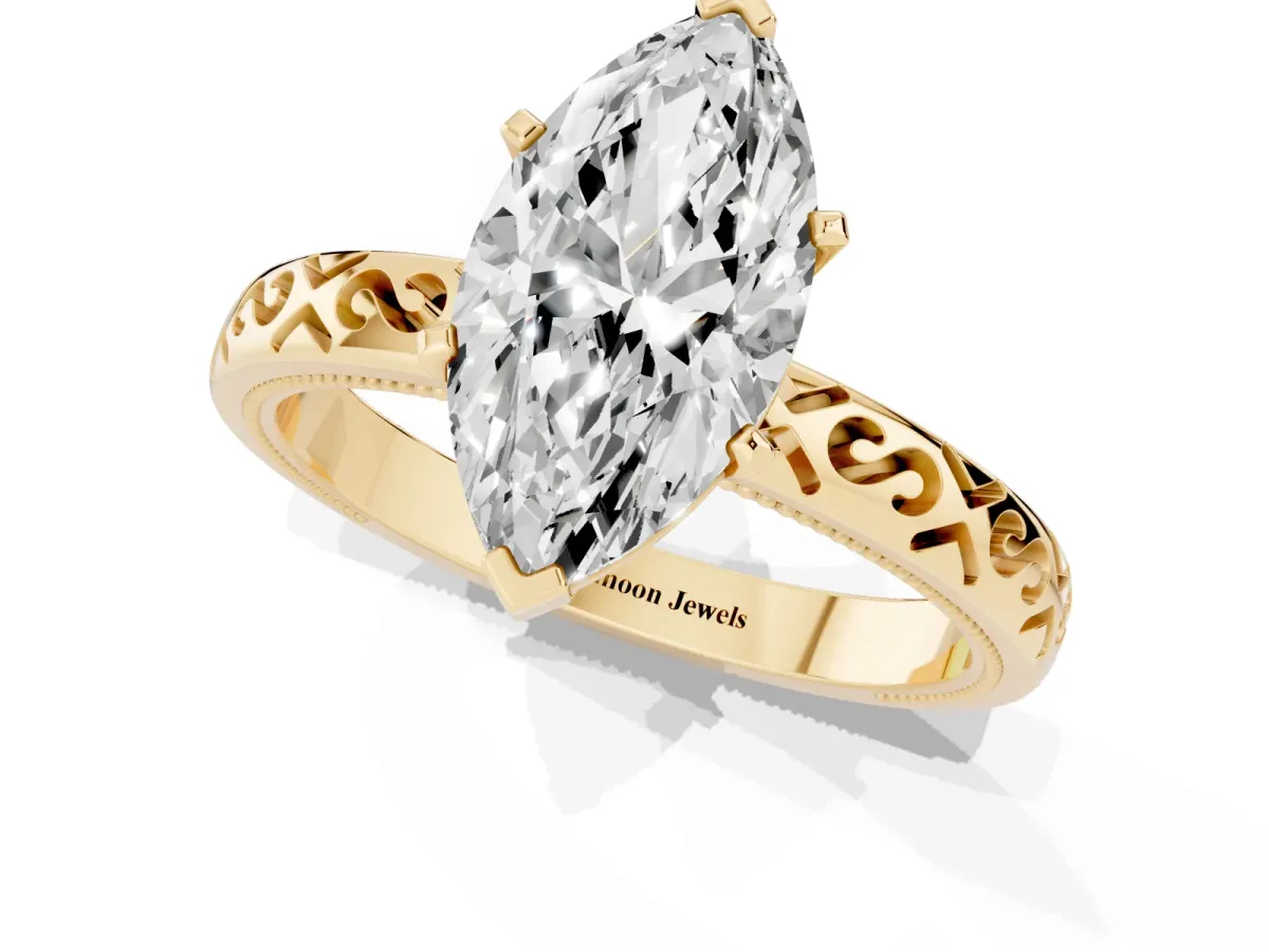Marquise Cut Solitaire Engagement Ring with Scrollwork Band and Four-Prong Setting Yellow gold