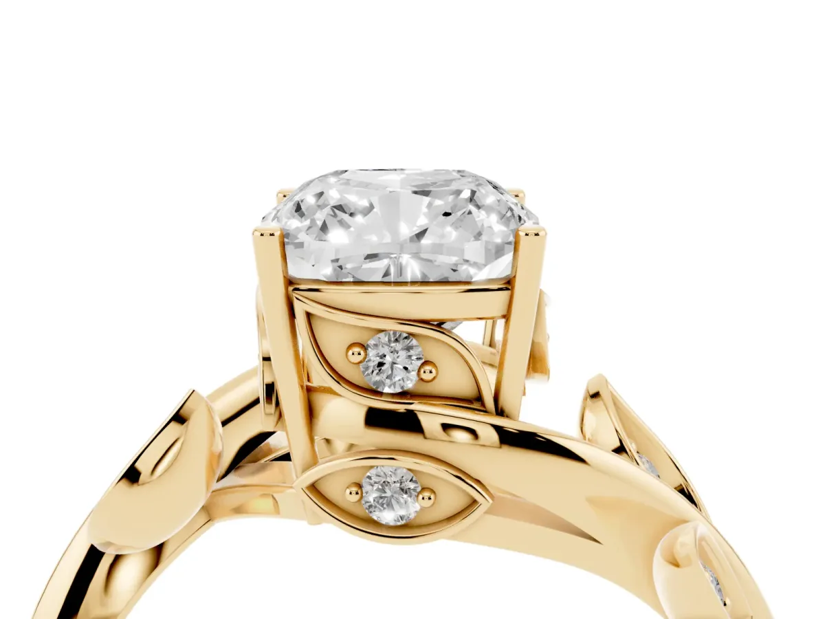 Cushion Cut Solitaire Twist Engagement Ring with Leaf Accents and Prong Setting Yellow gold