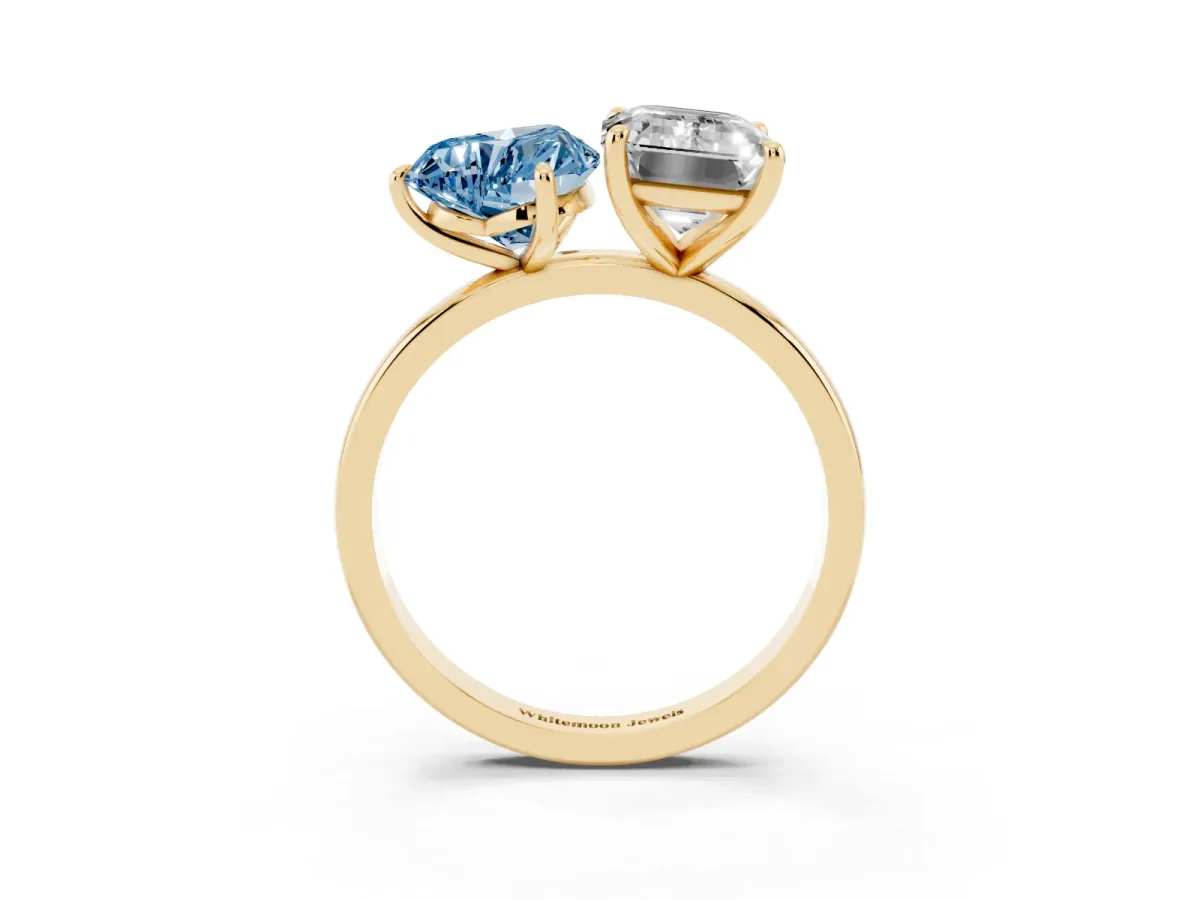 Fancy Blue Heart Cut and Emerald Cut Toi Moi Ring with Prong Setting Yellow gold
