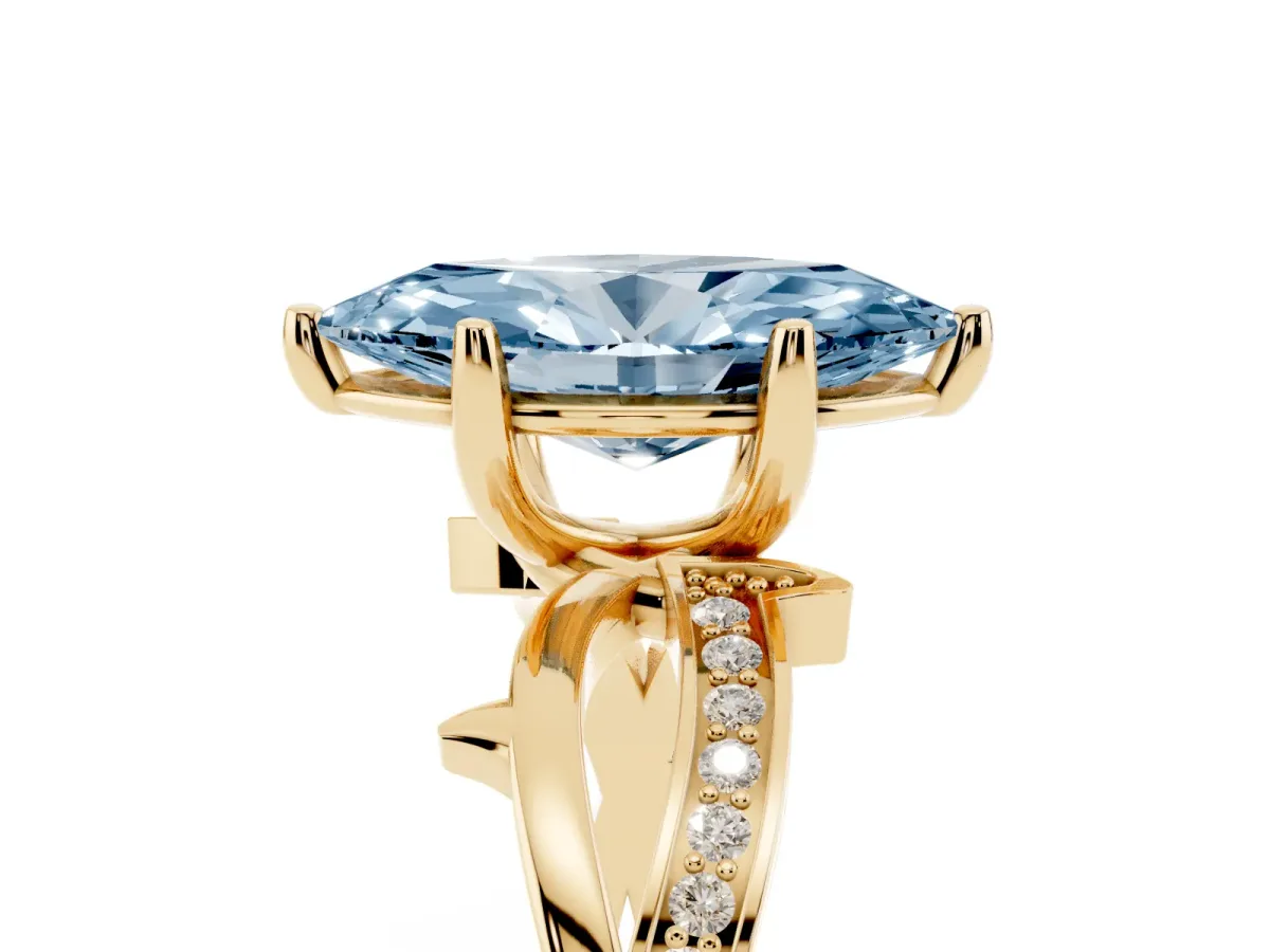 Fancy Blue Marquise Cut Solitaire Twist Band with Pavé Accents and Four-Prong Setting Yellow gold