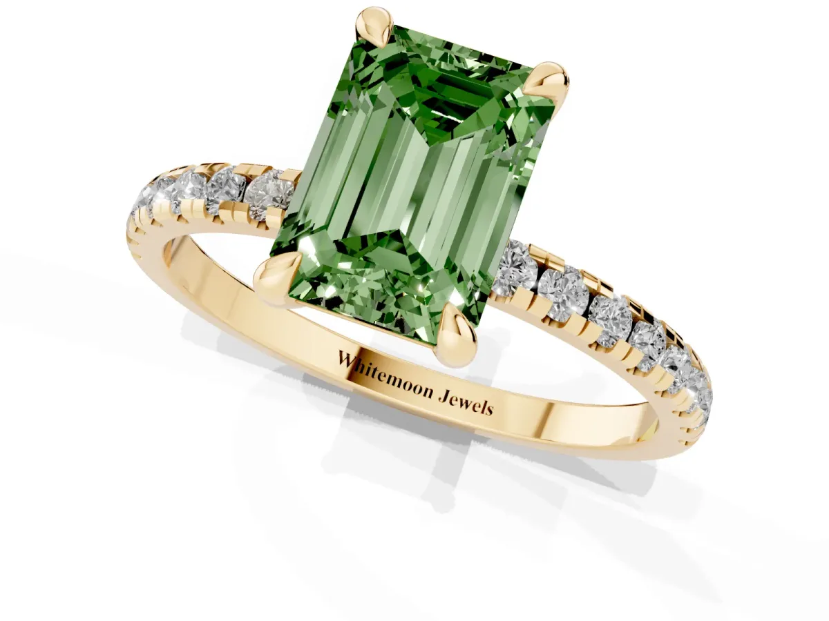 Fancy Green Emerald Cut Diamond Brilliant Solitaire Ring with Pavé Band and Four-Prong Setting Yellow gold