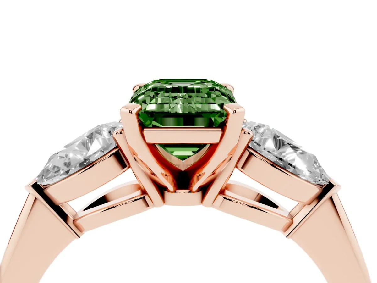 Fancy Green Three-Stone Emerald Cut Diamond Ring with Pear Side Stones and Four-Prong Setting Rose gold