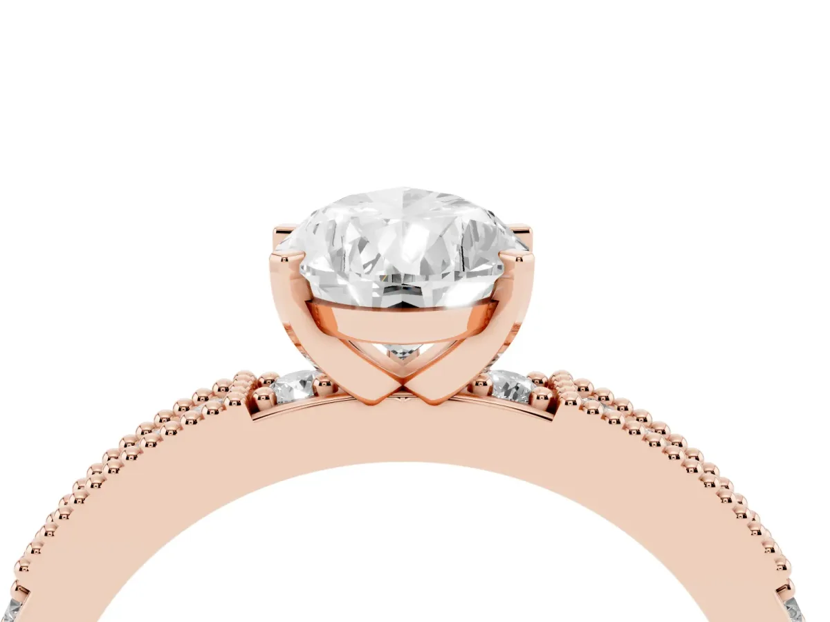 Pear Cut Solitaire with Pavé Band and Four-Prong Setting Rose gold