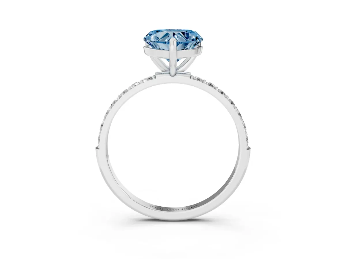 Fancy Blue Heart Cut Diamond Solitaire Ring with Round Pavé Band and Prong Setting Silver