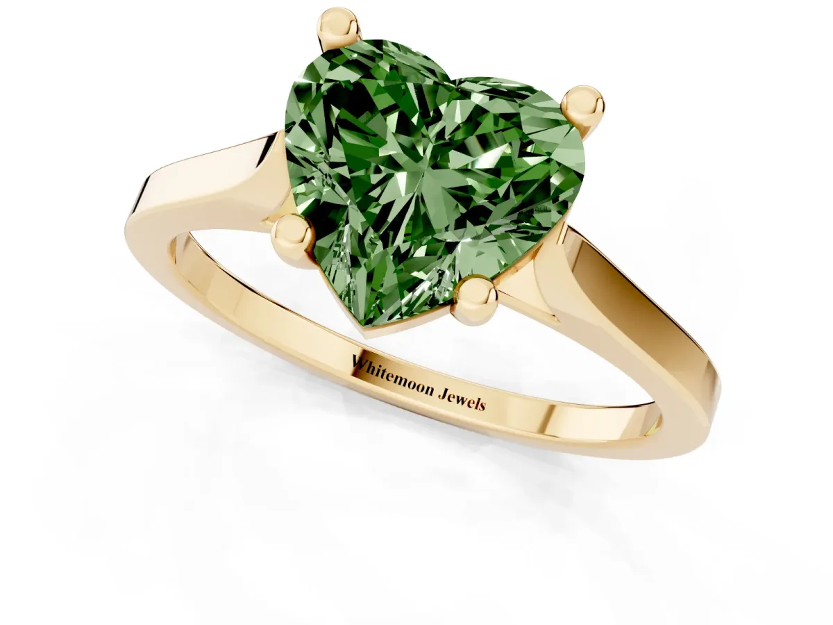 Fancy Green Heart Cut Solitaire Diamond Ring with Four-Prong Setting and Tapered Band Yellow gold