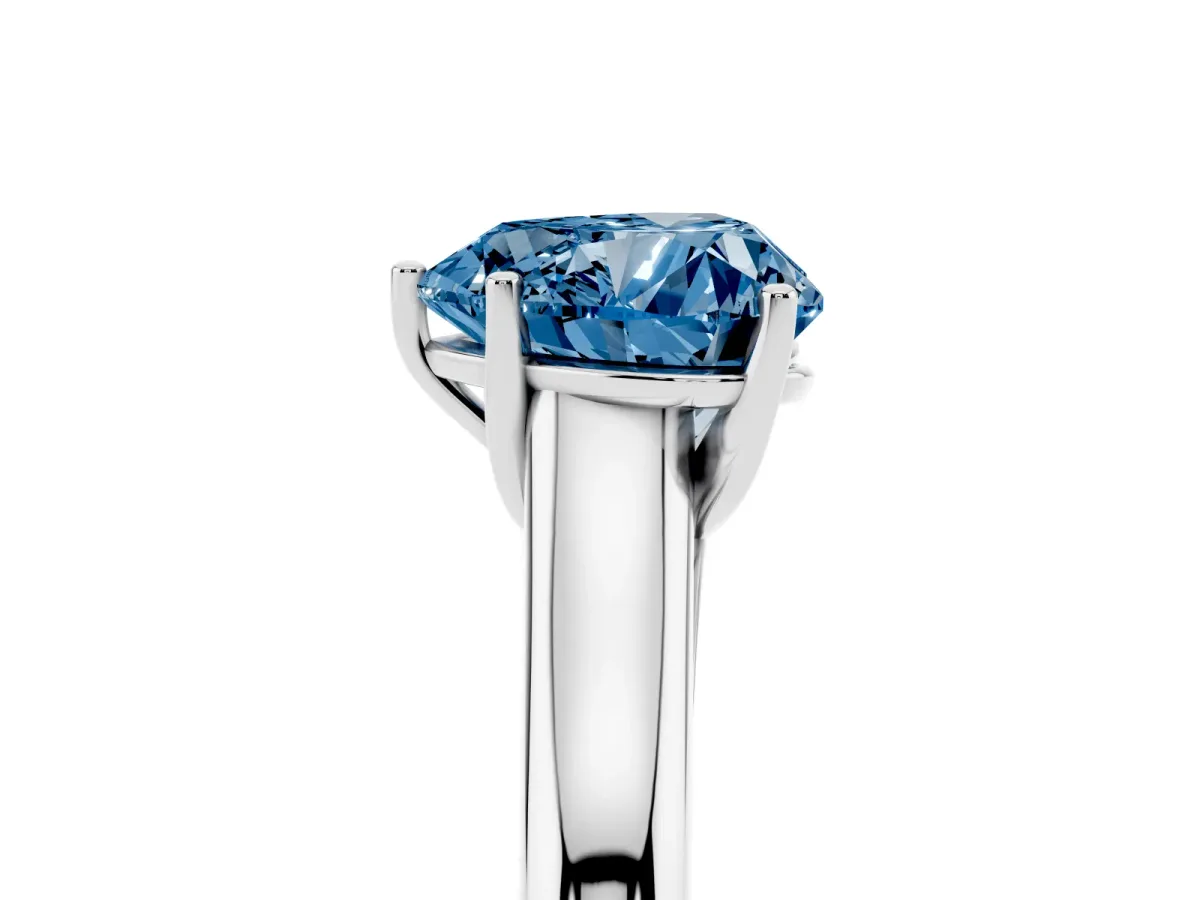 Fancy Blue Heart Cut Cut Diamond Solitaire Engagement Ring with Tapered Plain Band and Four-Prong Setting Platinum