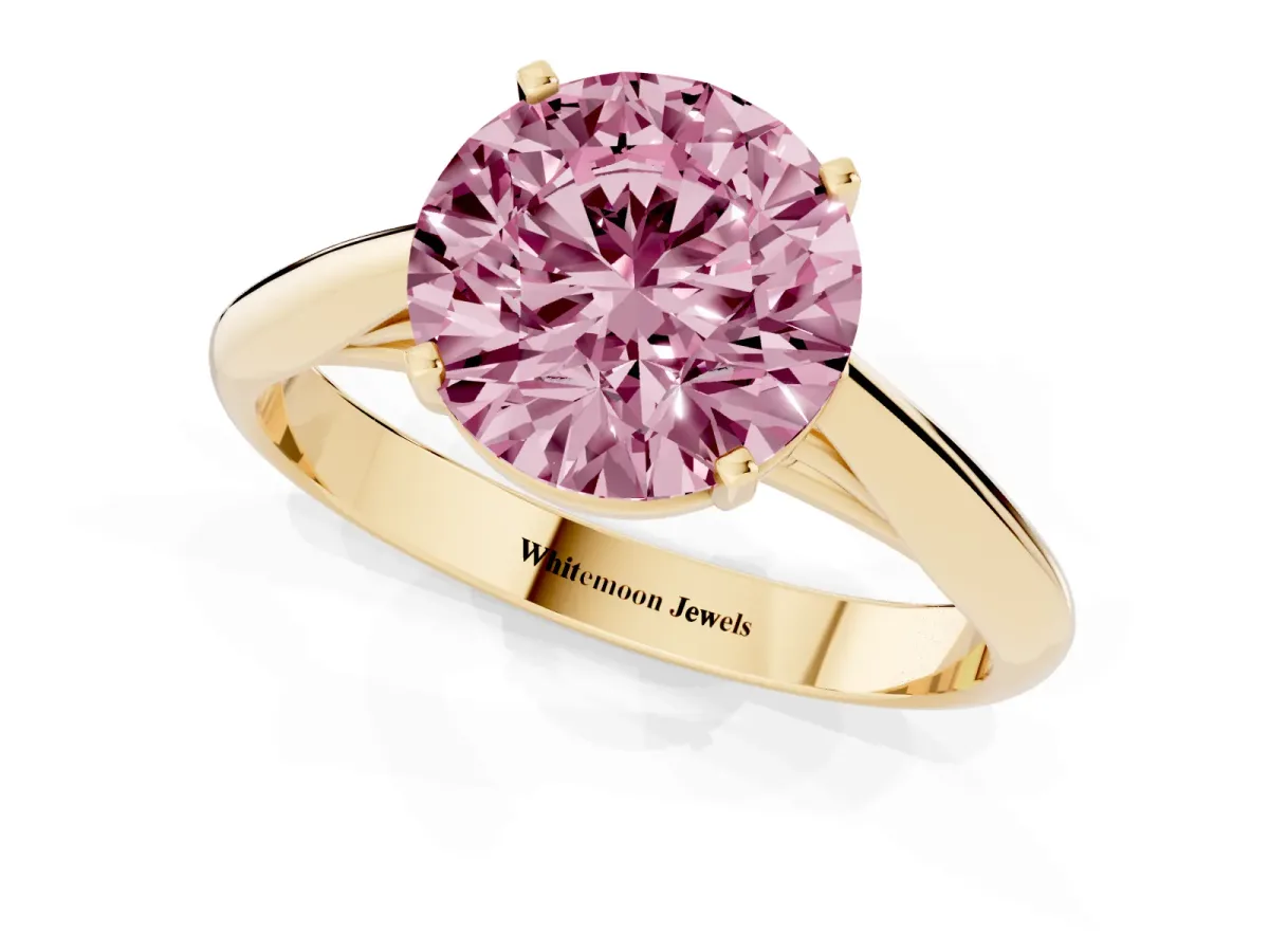 Fancy Pink Round Cut Diamond Solitaire Engagement Ring with Cathedral Setting and Four-Prong Mount Yellow gold