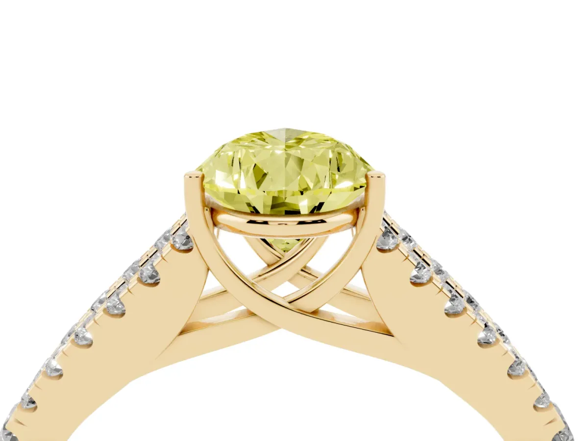 Fancy Yellow Pear Cut Diamond Split Shank Engagement Ring with Round Pavé and Prong Setting Yellow gold