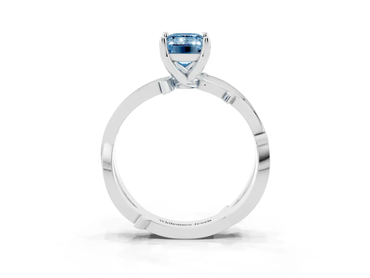 Fancy Blue Emerald Cut Solitaire Twist Band with Pavé Accents and Four-Prong Setting Platinum