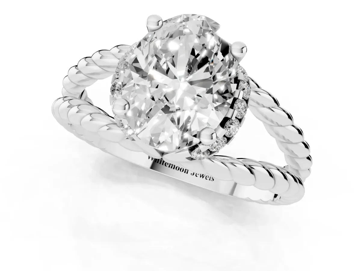 Oval Cut Halo Twisted Band Four-Prong Ring Silver