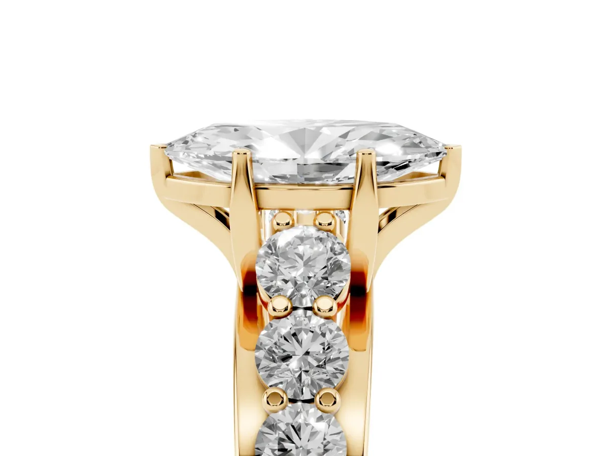 Marquise Cut Diamond Engagement Ring with Pavé Band and Four-Prong Setting Yellow gold