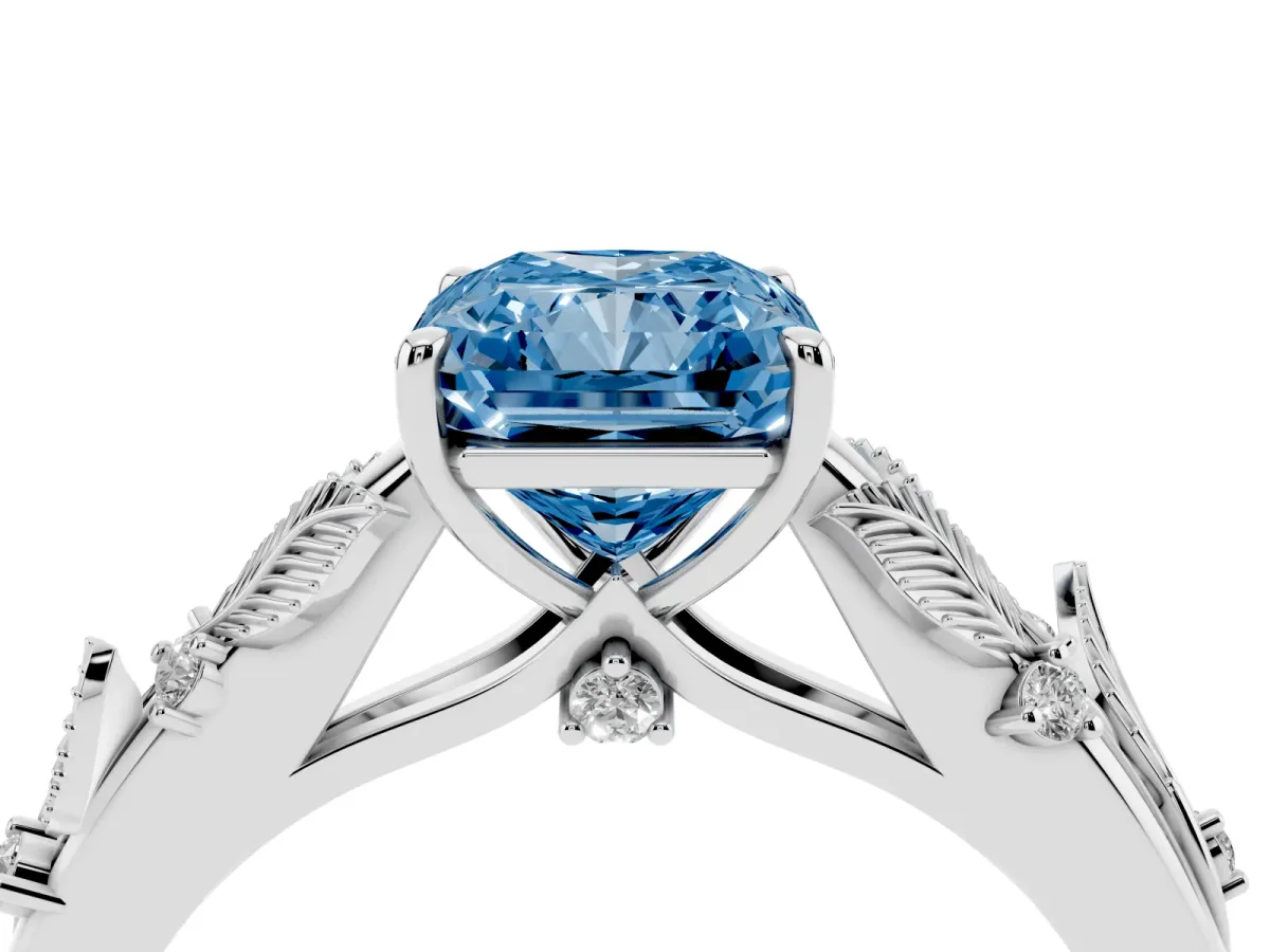 Fancy Blue Radiant Cut Diamond Solitaire Ring with Leaf Motif Band and Four-Prong Setting Silver