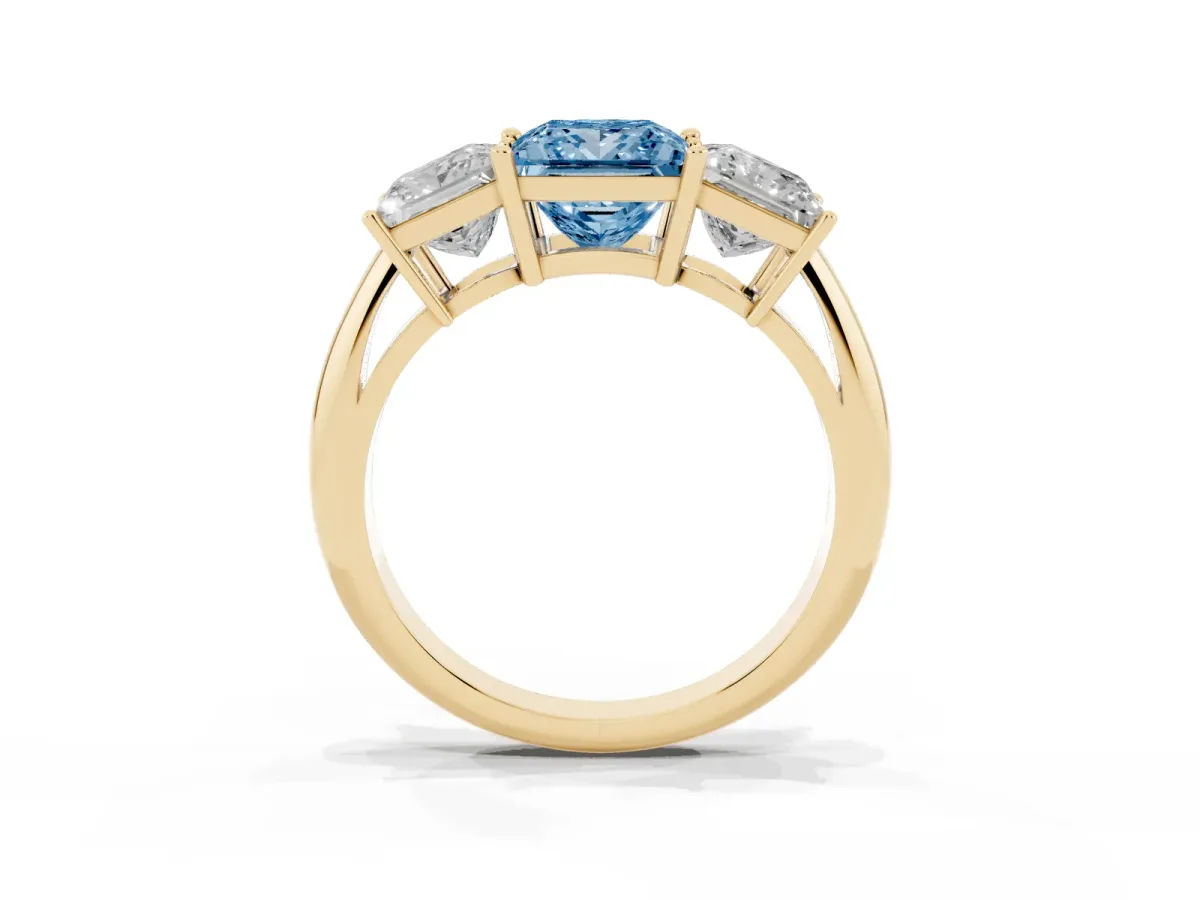 Fancy Blue Three-Stone Princess Cut Cut Diamond Engagement Ring with Prong Setting on a White Gold Band Yellow gold