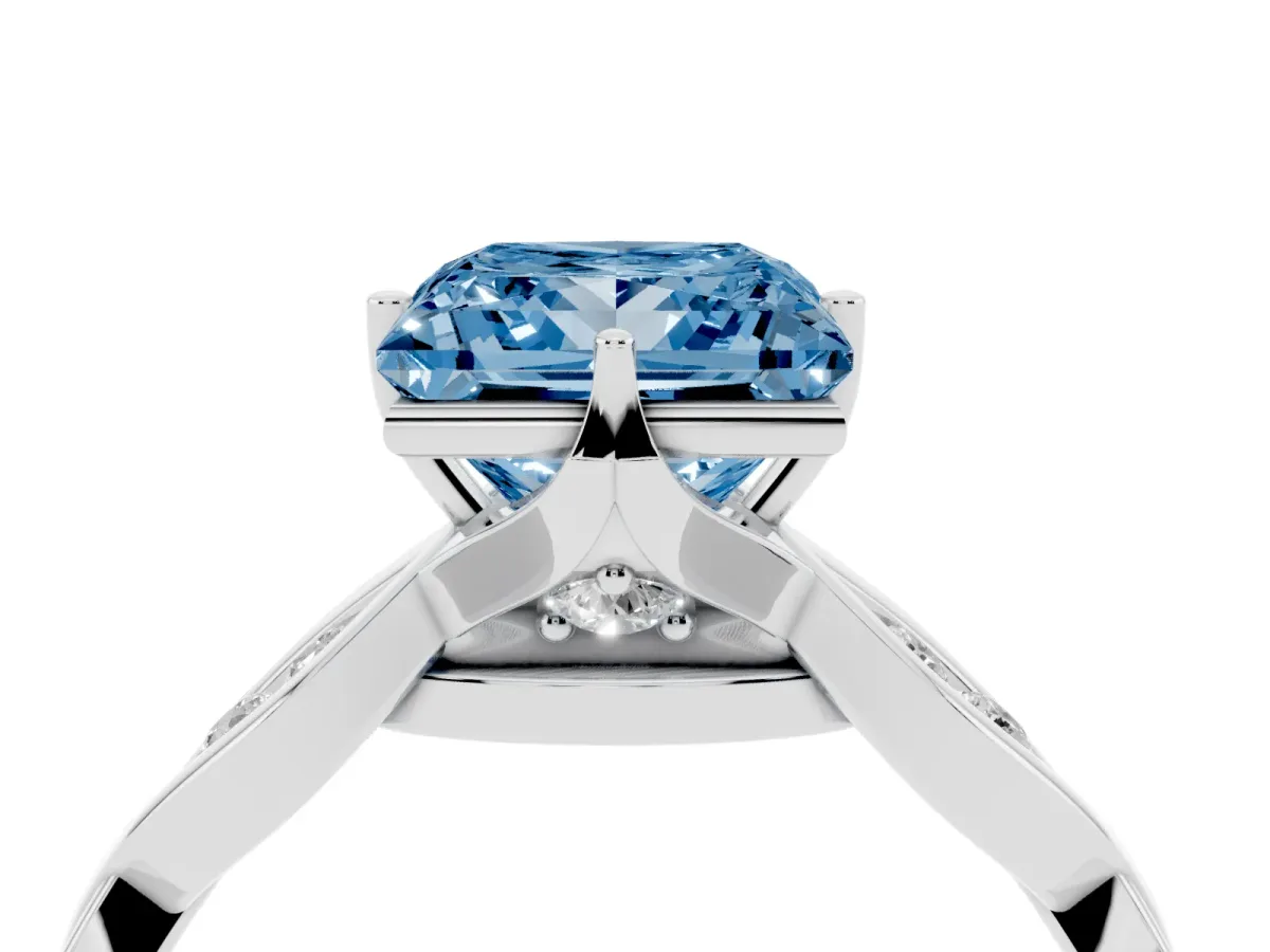 Fancy Blue Princess Cut Solitaire Twist Band with Leaf Prong Setting Silver