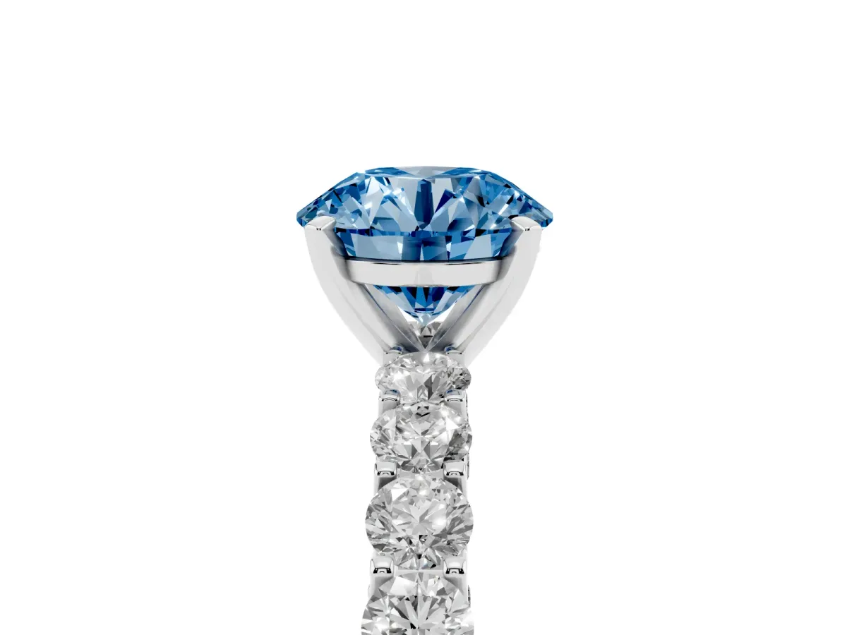 Fancy Blue Round Cut Diamond Solitaire Ring with Shared Prong Pavé Band and Four-Prong Setting Silver